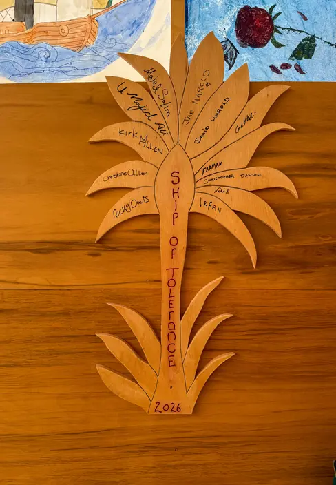 Ship of Tolerance palm tree artwork.