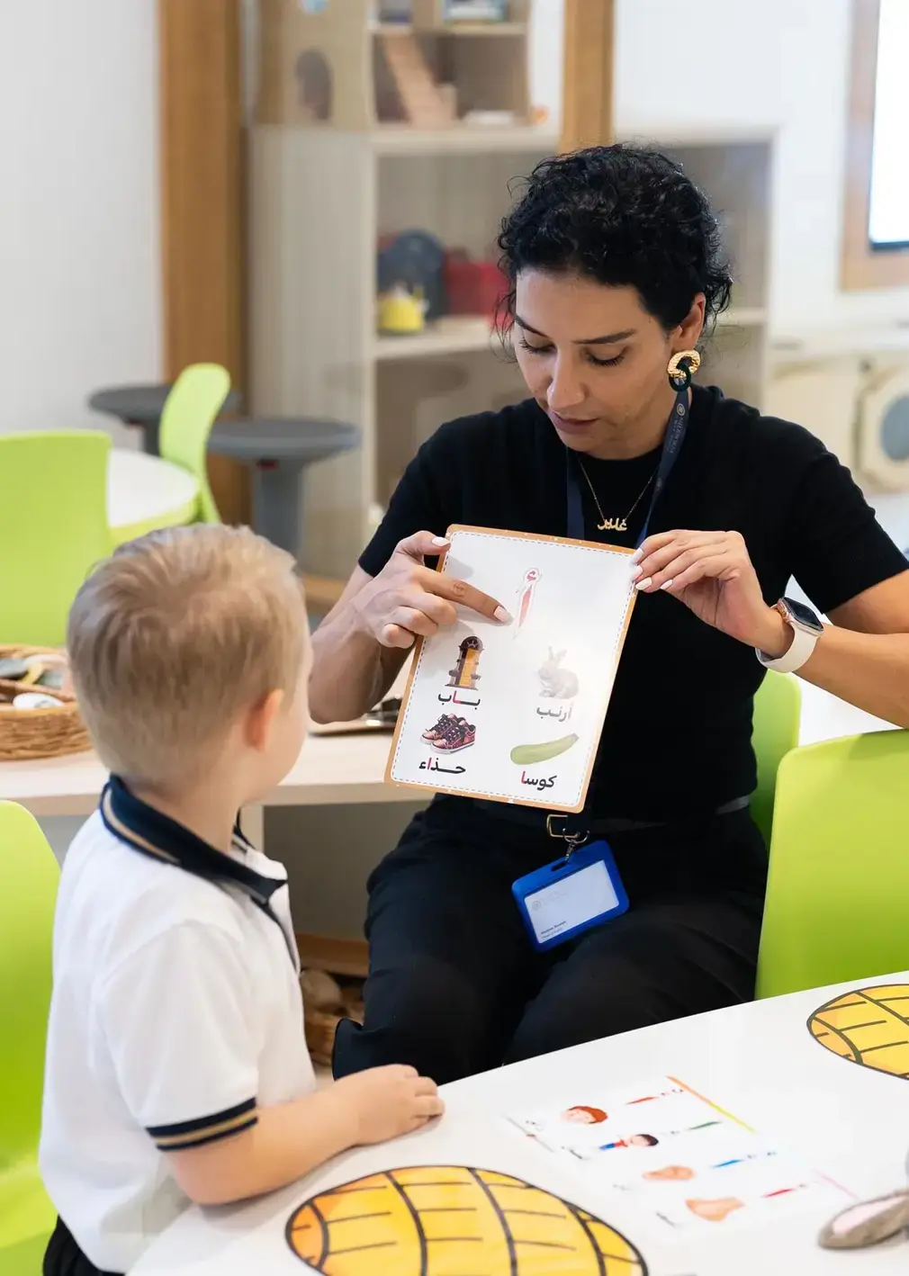 Sherborne School Jeddah teacher working with a student in an Arabic lesson.