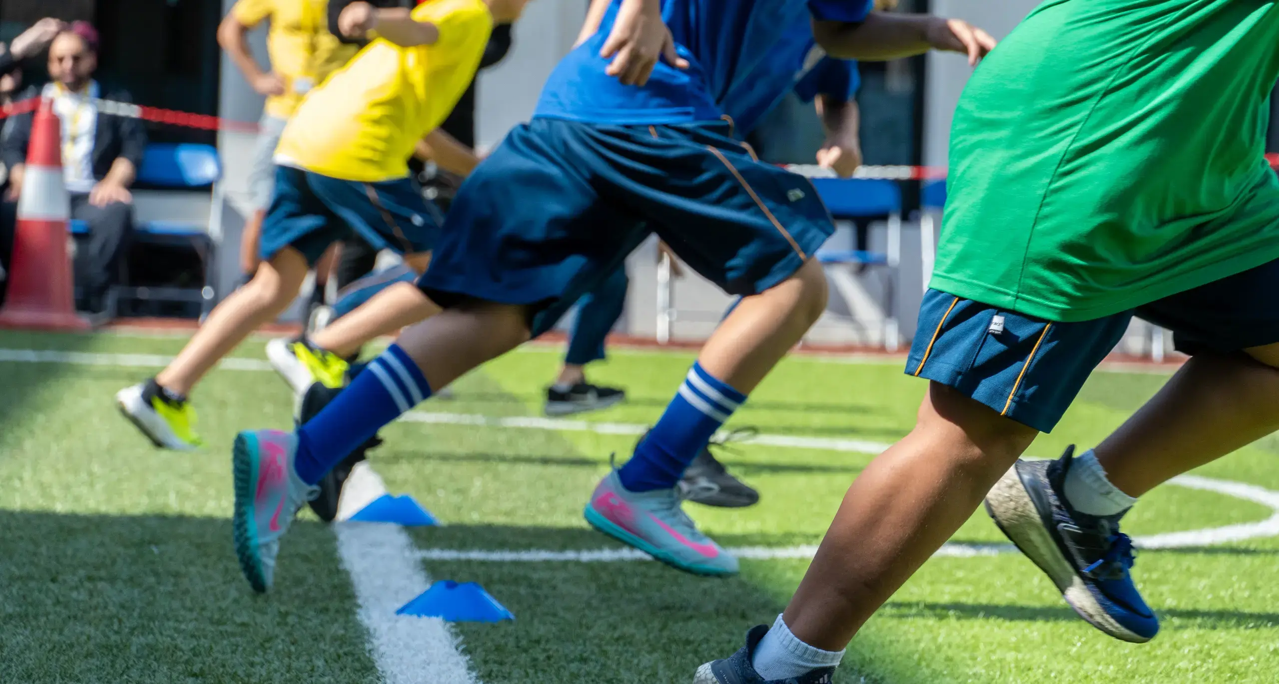 Sherborne School Jeddah students running at a sports event.