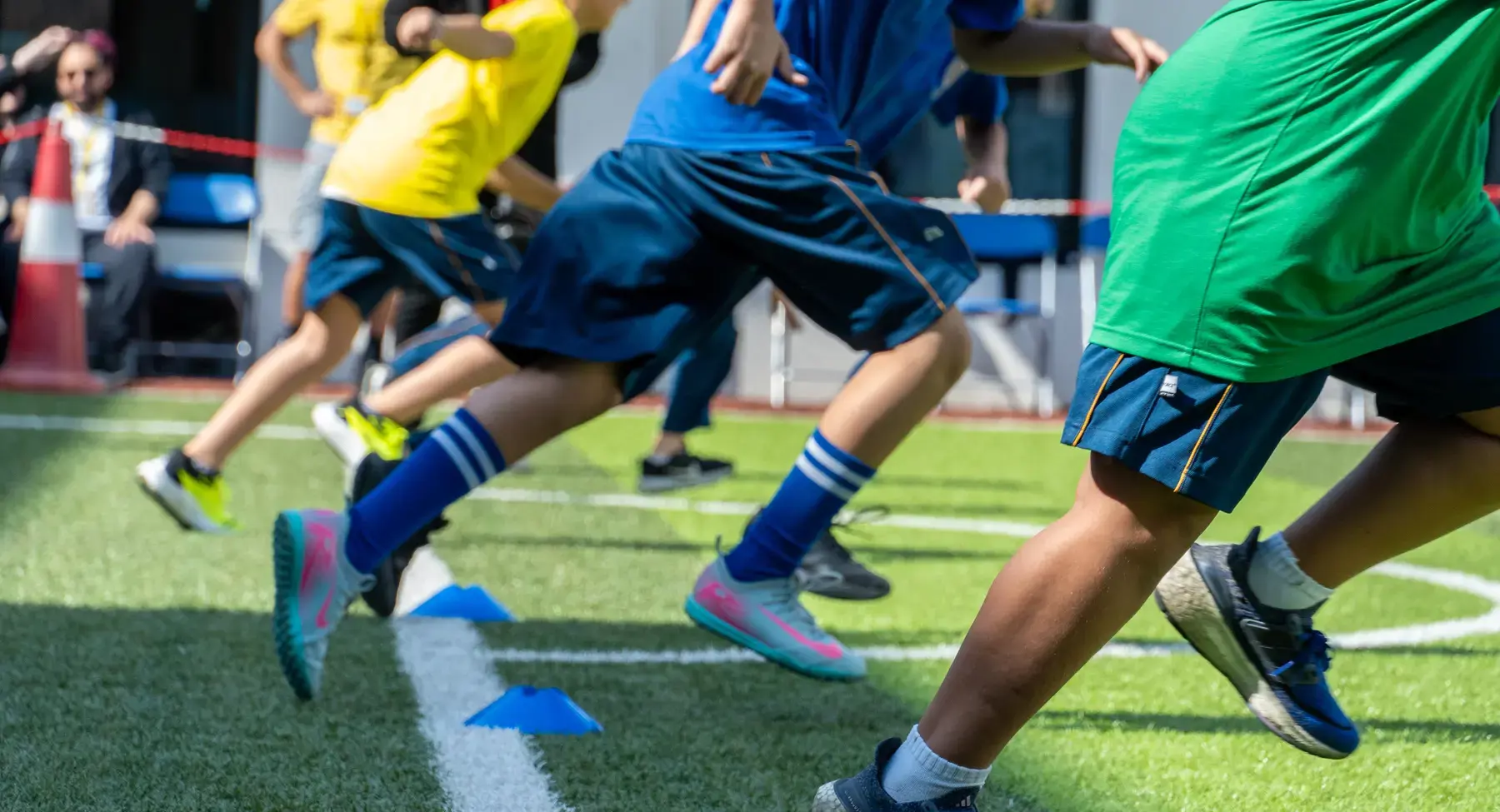 Sherborne Jeddah students running.