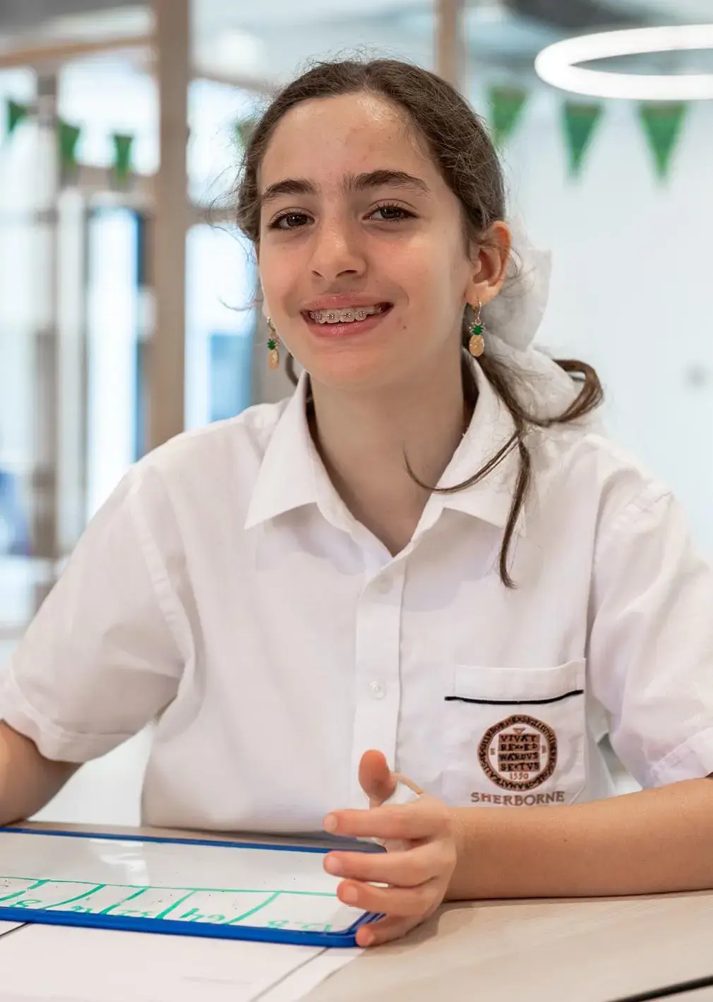 Isabel smiling in a lesson.